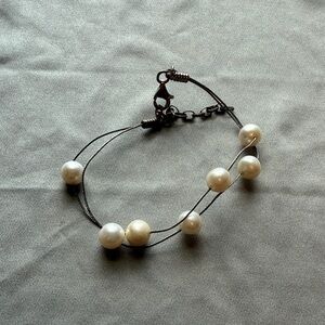 Elegant Pearl Bracelet with Black Cord